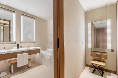 a bathroom with a sink and a mirror at Address Dubai Opera Residences by The S Holiday Homes in Dubai