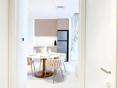 a kitchen with a table and chairs in a room at Amazing stay at Dubai creek with Balcony & View in Dubai