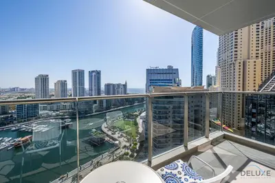 a balcony with a view of the city at Charming 1BR Apartment in Sparkle Tower 1, Dubai Marina by Deluxe Holiday Homes in Dubai