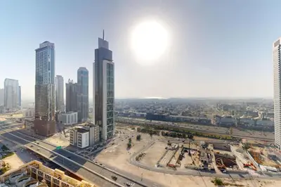 an aerial view of a city with tall buildings at Forte Tower 2 - Warm Two Bedroom in Dubai