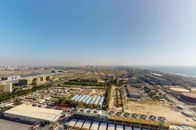 an aerial view of a city with the ocean at Studio One - Gorgeous Studio in Dubai