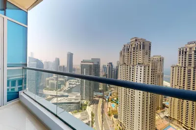 a view of a city from the balcony of a building at Bay Central - Enticing Two Bedroom in Dubai