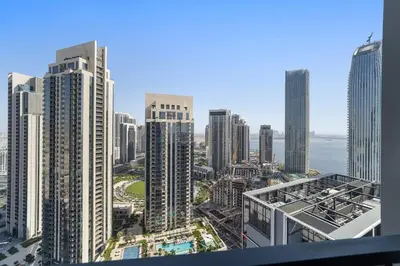 a view of a city with tall buildings at Stylish 1 Bedroom High Floor in Creek edge in Dubai