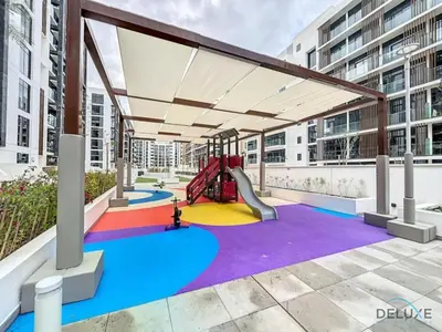 a playground with a slide in a building at Alluring Studio Apartment at Azizi Riviera 16, Al Merkadh by Deluxe Holiday Homes in Dubai