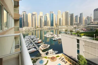 a view of a marina with boats in the water at Stunning Marina view apartment In Marina sail tower by Truebleu vacation homes in Dubai