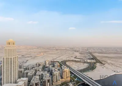 an aerial view of a city with tall buildings at 2-BR Getaway at Palace Residences, Dubai Creek in Dubai