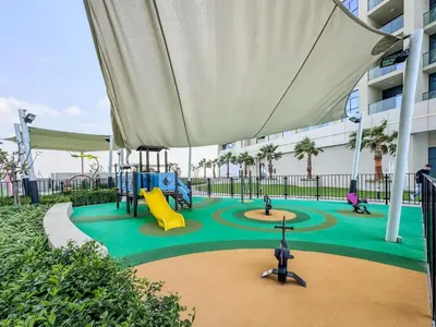 a playground in a building with a slide at Stylish Studio with Great Views High Floor in Dubai