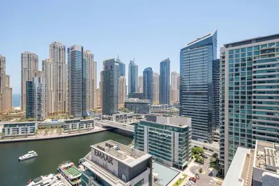 a view of a city with a river and buildings at Frank Porter - Al Majara Tower 2 in Dubai