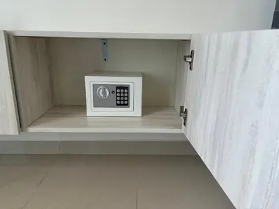 a microwave in a cabinet in a room at Vacation Friendly Beach View Luxury 1Bedroom- Walk To Beach & Mall in Dubai