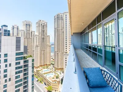 a balcony with a view of a city at 2 Bedroom Smart Home with a Panoramic Marina View in Dubai