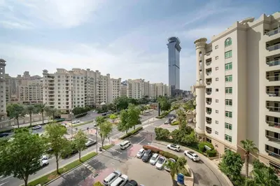 a view of a city with buildings and a tower at Spacious 3 Bedroom Palm Apartment in Dubai