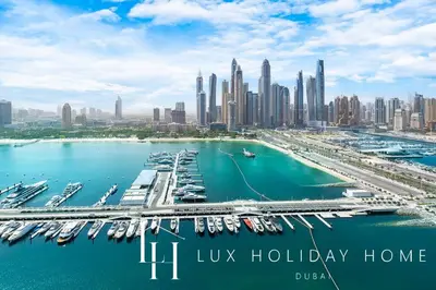 a view of the city of dubai with a marina at LUX The Marina Vista Beachfront Suite 3 in Dubai