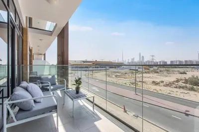 a living room with a view of a highway at Fantastic1BR Furnished Apt at Azizi Park Avenue! in Dubai