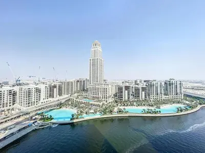 an aerial view of a large city with buildings at Palace Residences - Chic Two Bed with Creek Views in Dubai