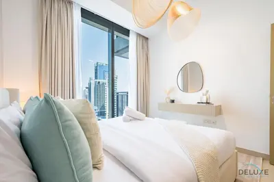 a bedroom with a bed with a large window at Alluring 1BR with Marina View at 5242 Tower 2 Dubai Marina by Deluxe Holiday Homes in Dubai