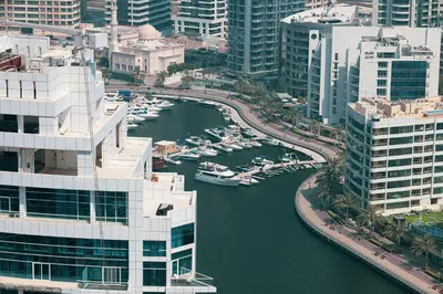 an aerial view of a river with boats in a city at Address Beach Resort JBR - 1 BR in Dubai