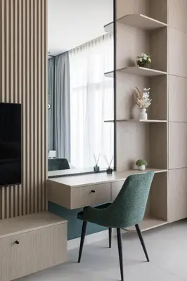 a living room with a desk and a chair at Cozy Studio in Westwood By IMTIAZ in Dubai