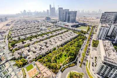 an aerial view of a city with tall buildings at Sobha waves I Cozy 1BDR I Burj Khalifa View in Dubai