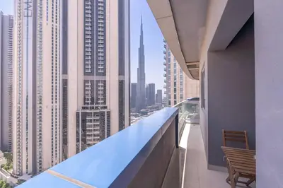 a balcony of a building with a view of a city at New Listing & Burj Khalifa View & Dubai Mall in Dubai