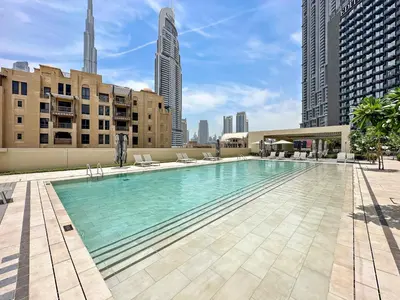 a large swimming pool on top of a building at Silkhaus High Floor Luxury 1 BDR with Stunning View in Dubai