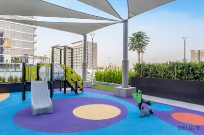 a playground on the roof of a building at Inviting Studio Apartment at Azizi Riviera 36 in Al Merkadh by Deluxe Holiday Homes in Dubai