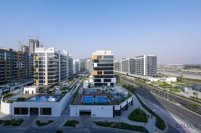 an aerial view of a city with tall buildings at Inviting Studio Apartment at Azizi Riviera 36 in Al Merkadh by Deluxe Holiday Homes in Dubai