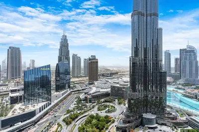 an aerial view of a city with tall buildings at Deluxe 3BR Home in Address Opera with Full Burj View in Dubai