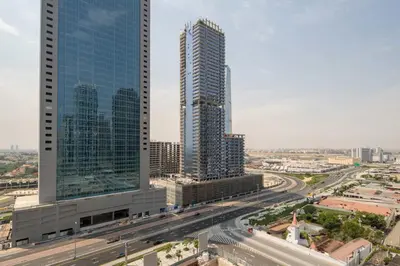 an aerial view of a city with tall buildings at Frank Porter - Goldcrest Views 2 in Dubai