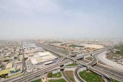 an overhead view of a highway interchange in a city at Frank Porter - Aykon City Tower C in Dubai