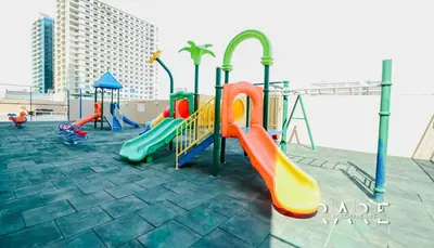Gallery image of Rare Holiday Homes - Lake View - The Lago Vista Tower A - Dubai Production City - R1503 in Dubai