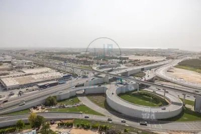 an overhead view of a highway with a gateway arch at Designer 1BR on High Floor Downtown Vibes in Dubai