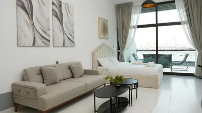 a living room with a couch and a bed at Dimorelux l Club Vista Mare l Five Palm Jumeirah in Dubai