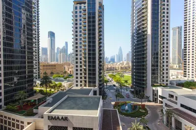 a view of a city with tall buildings at Spacious 1BR - Elite Downtown Residence - Short Walk to Burj & Dubai Mall in Dubai