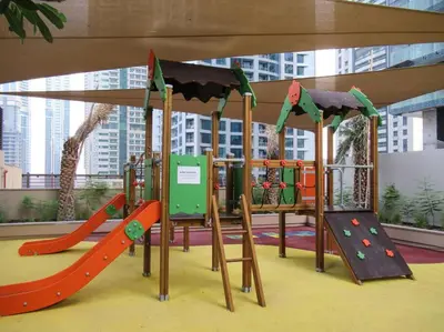 a play area with slides and slidesktop at Stylish 3BR Apartment in Dubai Marina with Pool, Gym, and Views in Dubai