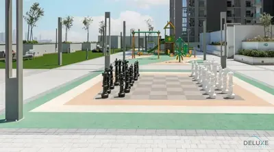 a chess board in the middle of a playground at Charming 1BR Apartment in Sobha Creek Vistas Reserve, Al Merkadh by Deluxe Holiday Homes in Dubai