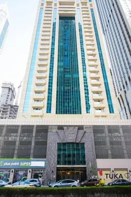 a tall building with cars parked in front of it at 3-BHK - Dubai Marina - 44th Floor - 5mins to beach in Dubai