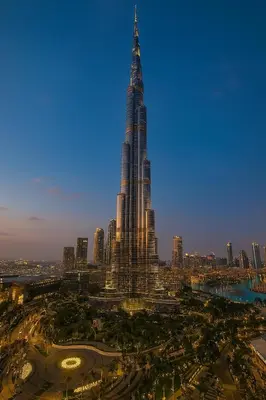 a city with a tall building and a city skyline at Stunning Burj Khalifa & Fountain view - Dubai Mall Access, Burj vista Downtown Dubai in Dubai