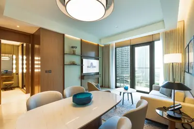 a living room with a couch and a table at Deluxe Address Opera Home with Full Sea View in Dubai