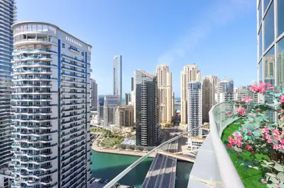 a view of a city skyline with tall buildings at Livbnb - Contemporary Suite with Private Plunge Pool in Dubai