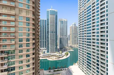 an aerial view of a city with tall buildings at Elegant 1 BR Apartment near Mall of the Emirates in Dubai