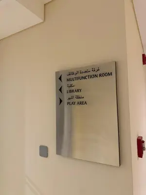 a sign on a wall in a room at Amazing 1BR in Dubai Marina with Luxury Interiors in Dubai