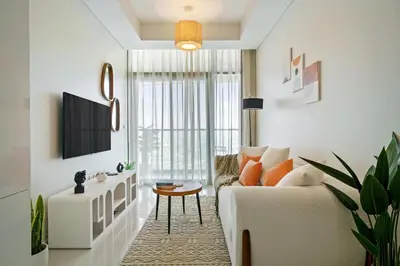 a living room with a couch and a table at DAYF-FSL 1-Bedroom in Business Bay near Downtown Dubai in Dubai