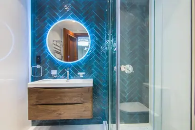a bathroom with a sink and a mirror at Fairmont Residences, Exquisite 2BR Luxury Retreat in Dubai