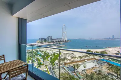a balcony with a view of the beach and water at Address Residential 2 BDR, JBR in Dubai