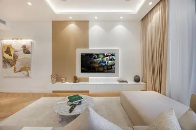 a living room with a couch and a table at Daniels Full Sea View 3BR in Oceana Atlantic in Dubai