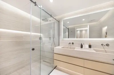 a bathroom with a glass shower and a sink at Daniels Full Sea View 3BR in Oceana Atlantic in Dubai