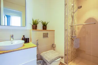 a bathroom with a sink and a shower at Collective 2,0 Dubai Hills- Attractive 1-BR in Dubai