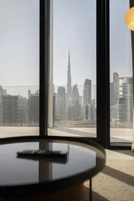 a view of a city skyline from a window at Modern Studio at Upside Living, Business Bay with Burj Khalifa View in Dubai