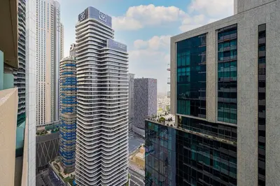 a view of a city skyline with tall buildings at Stylish Studio in Heart Downtown Next Dubai Mall in Dubai