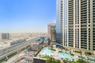 an aerial view of a city with tall buildings at FIRST CLASS Studio Luxe Living in Dubai
